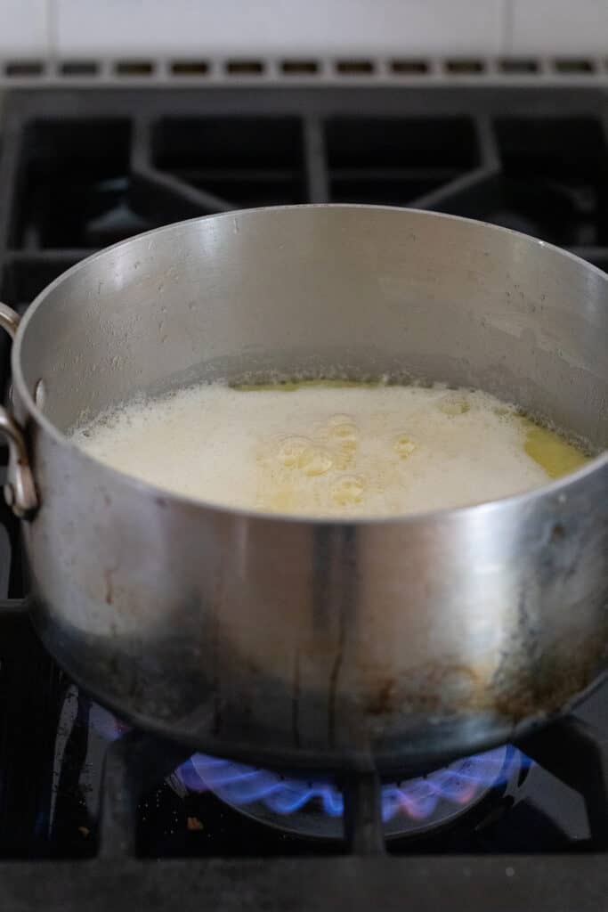 ingredients in a pot simmering over medium heat