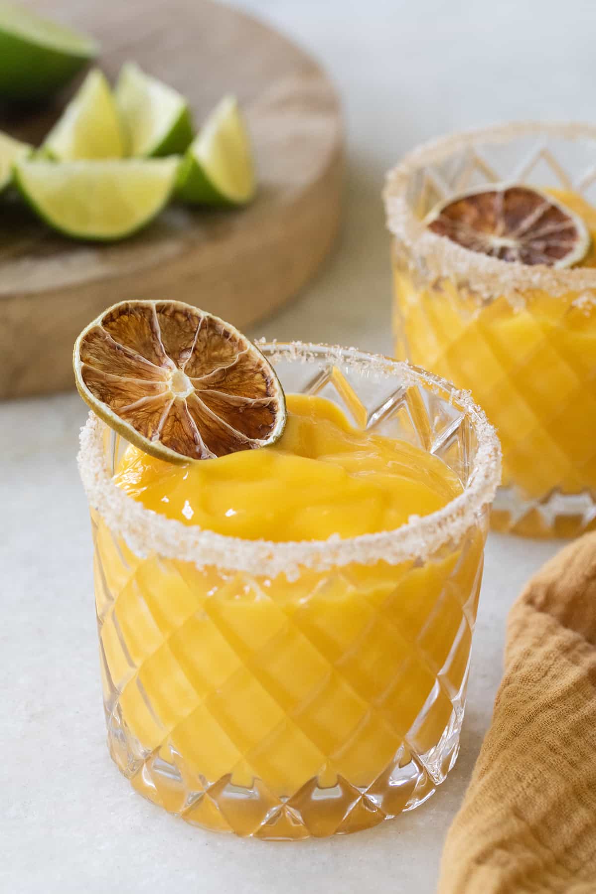 Frozen mango margarita recipe with lime and salt. 