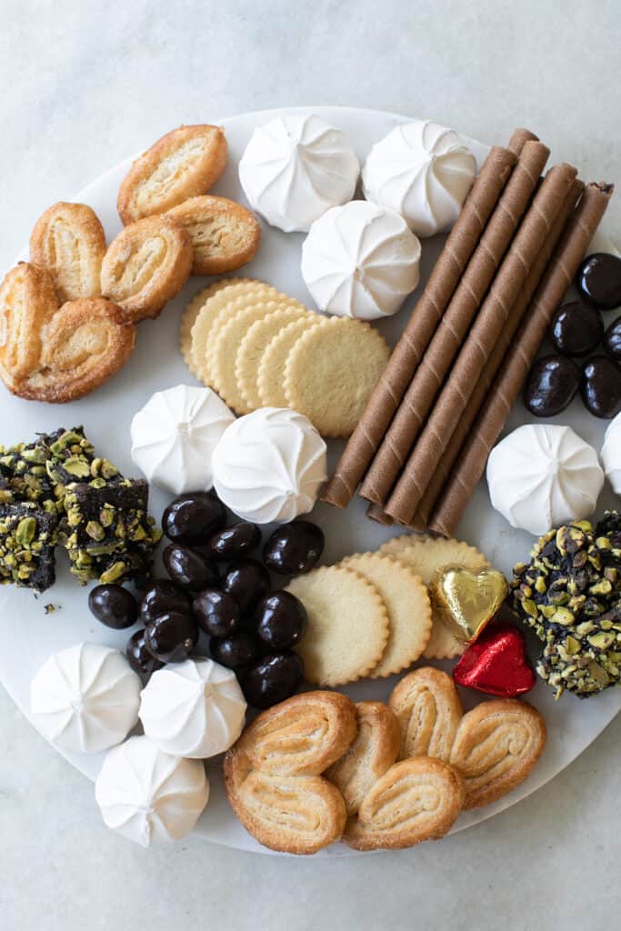 Putting together a Christmas dessert board.
