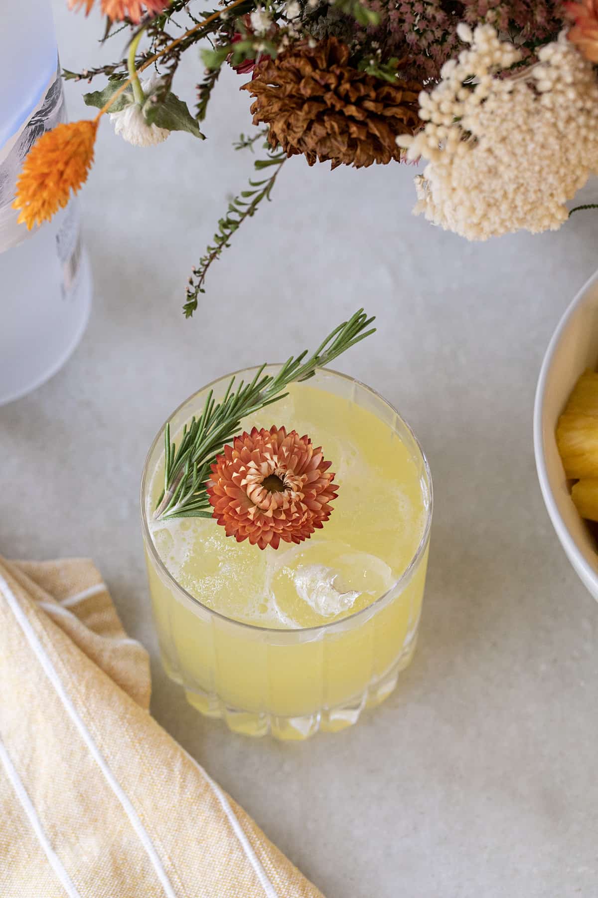pineapple cocktail on a marble table.
