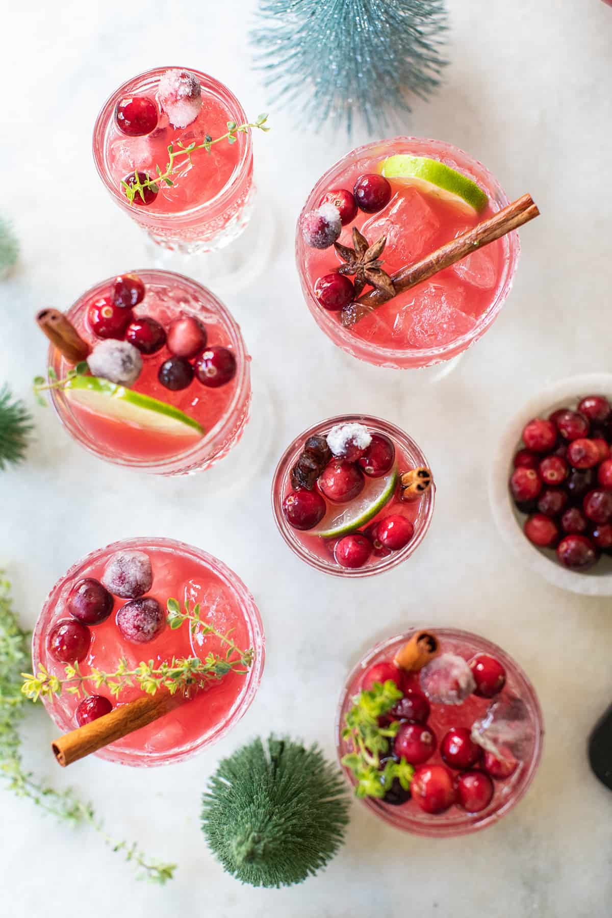 Non Alcoholic Christmas Punch with cranberries, lime and thyme.