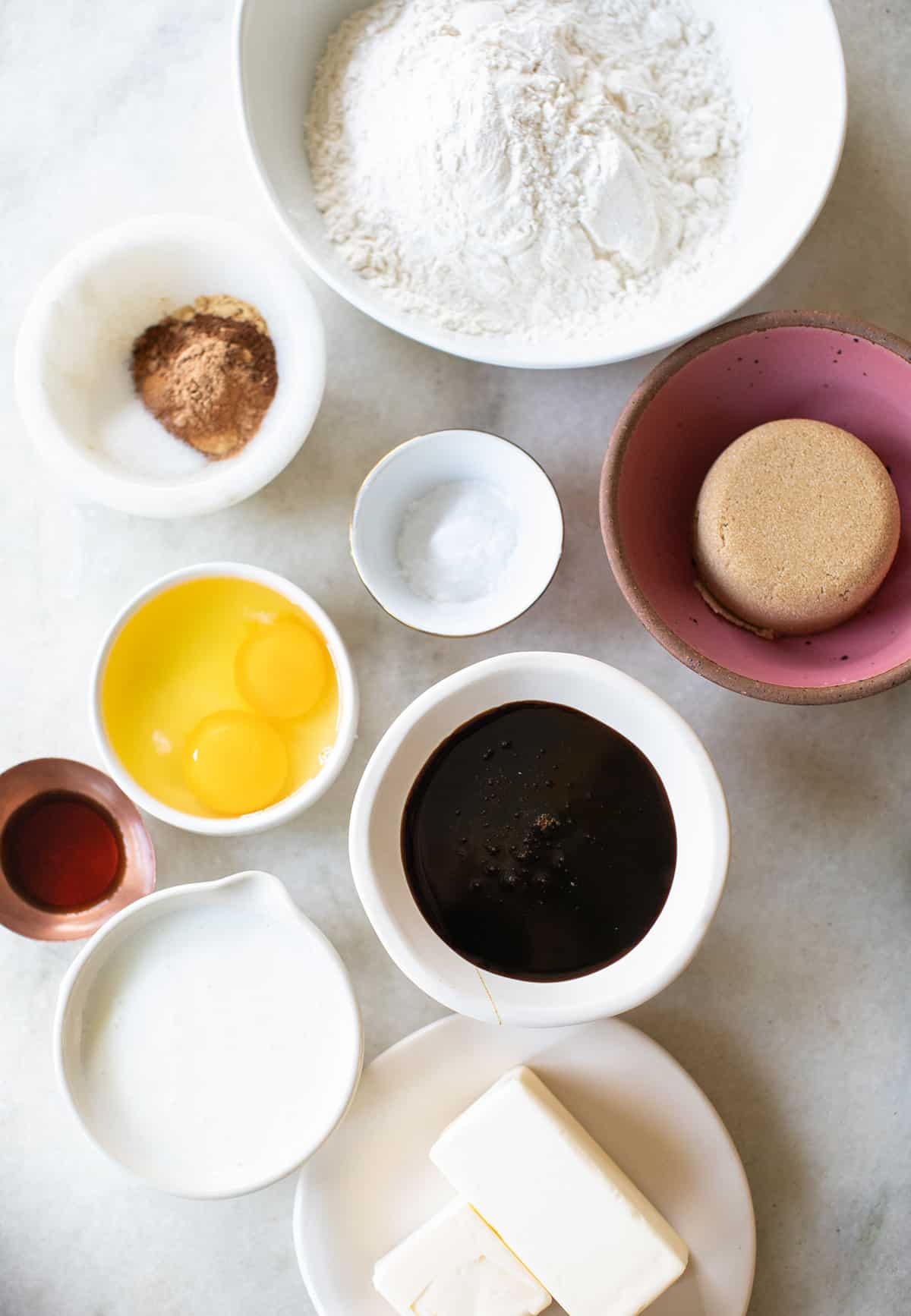 Ingredients in bowls to make a gingerbread trifle.