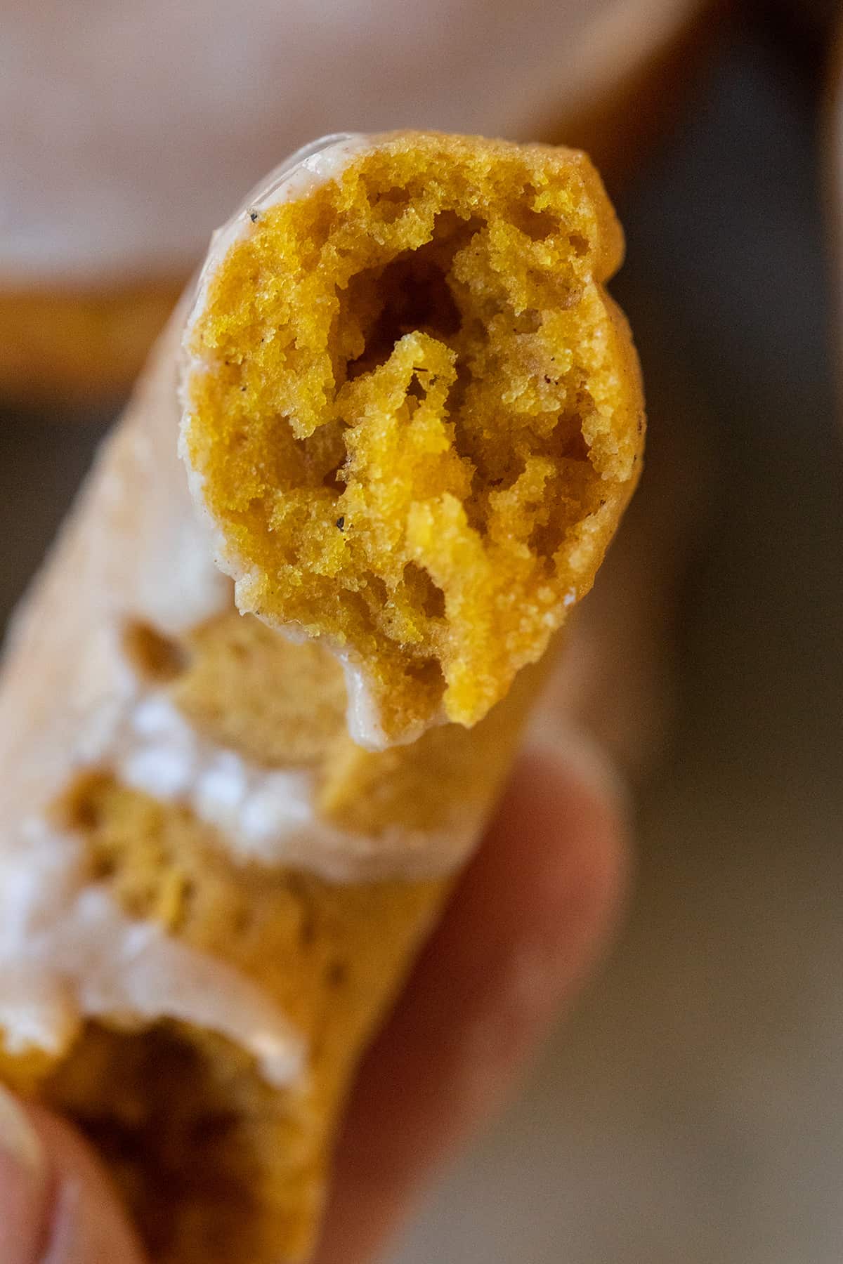 Inside of a pumpkin cake donut.