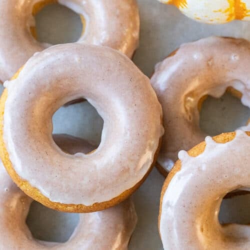 Baked pumpkin donuts with glaze.