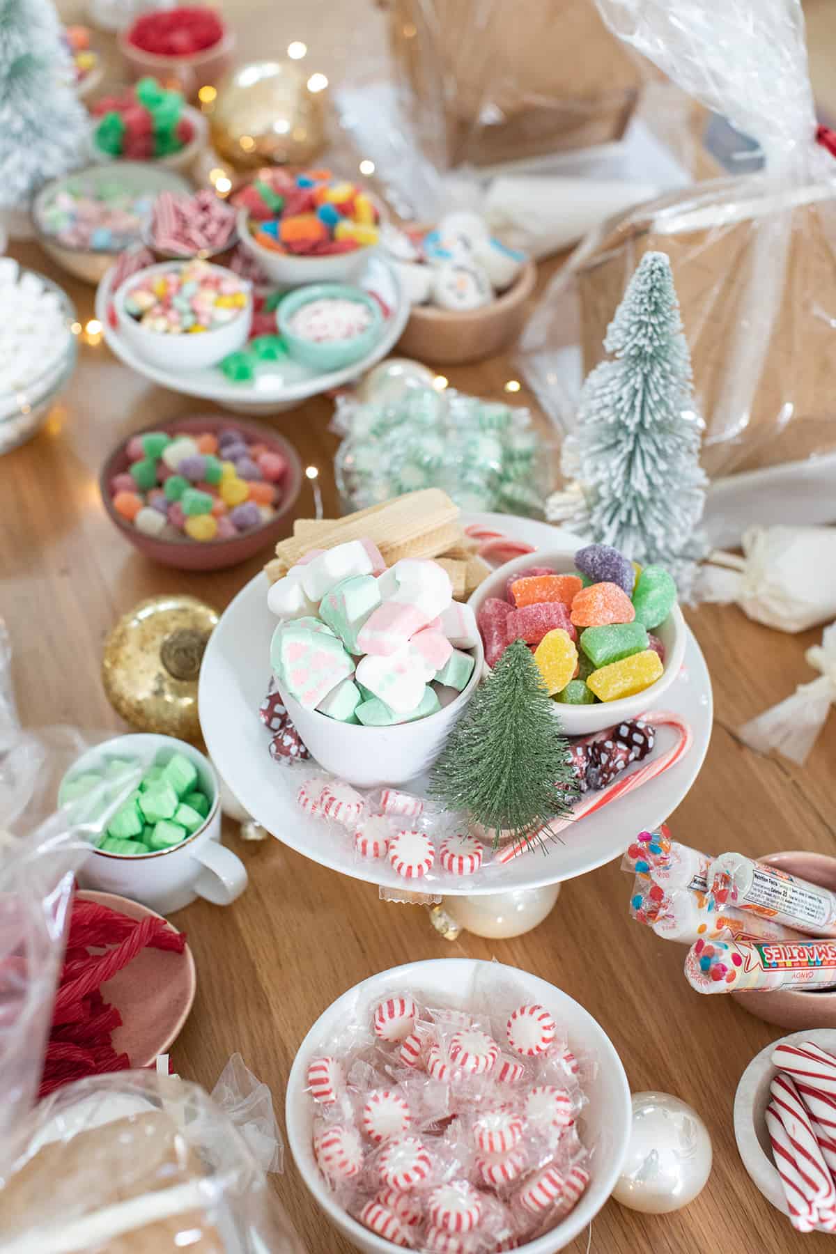 Gingerbread house making party with candy on the table.
