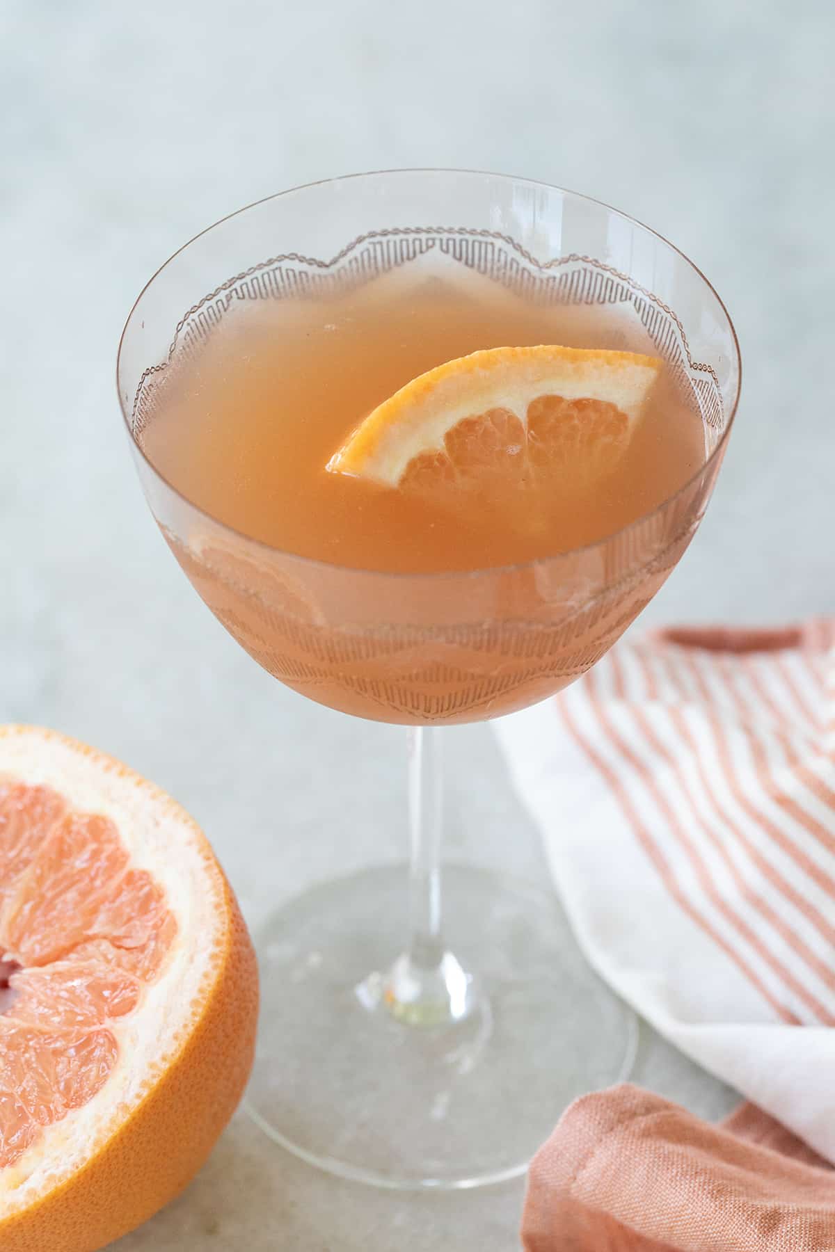 Pink cocktail with grapefruit juice.