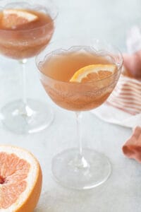 Grapefruit martini recipe with a grapefruit wedge.