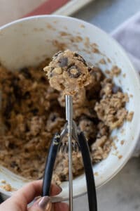 Cookie scoop, scooping out cookie dough.