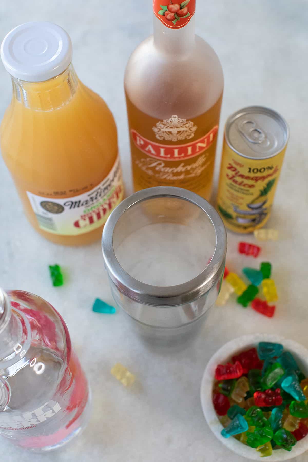 Pineapple juice, raspberry vodka, apple juice and gummy bears.