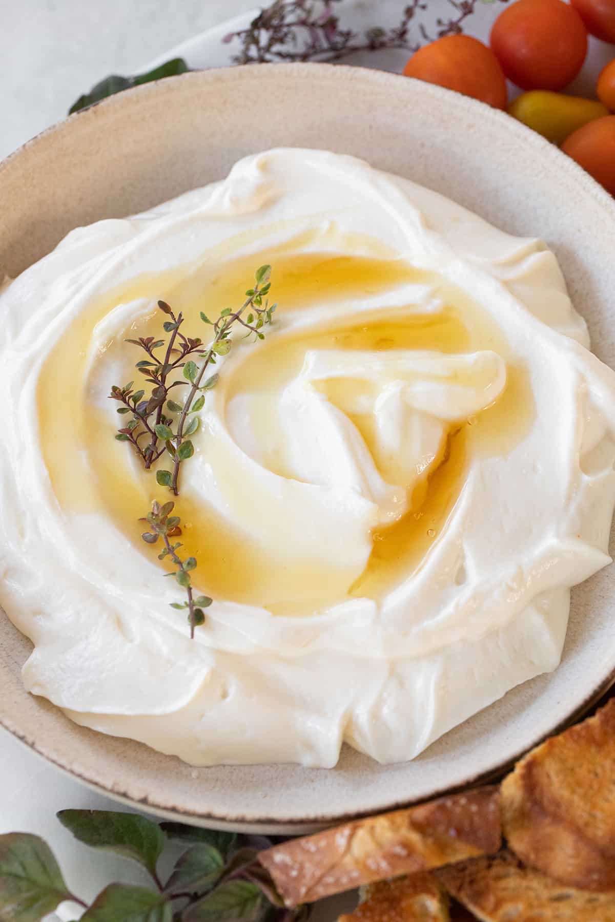 Honey drizzled over whipped ricotta.