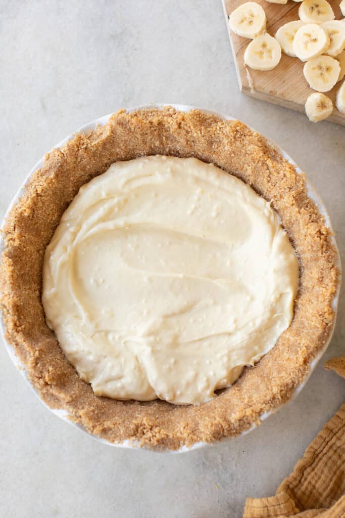 Banana pudding pie poured into a Nilla wafer crust.