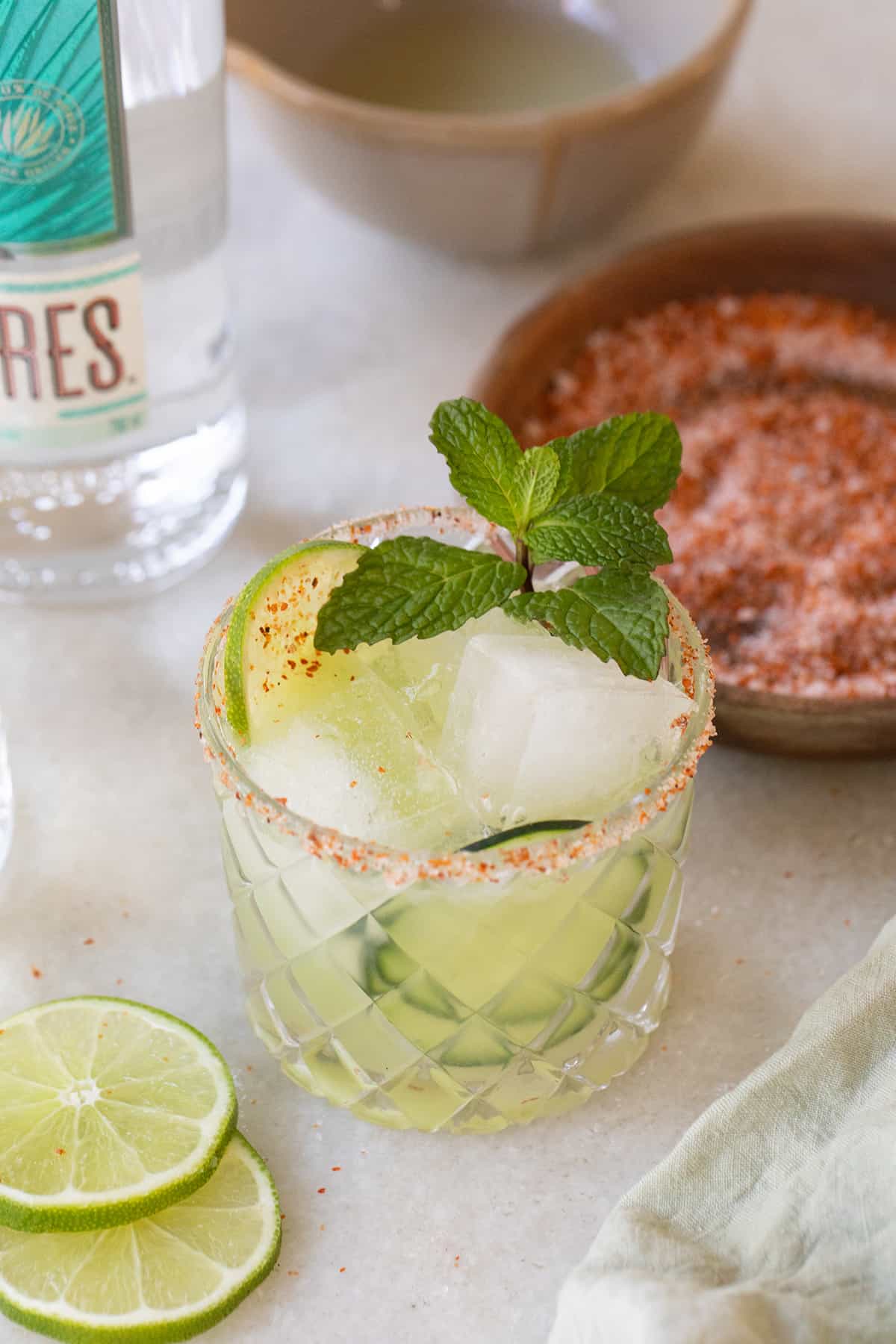 Cucumber margarita with lime and mint.