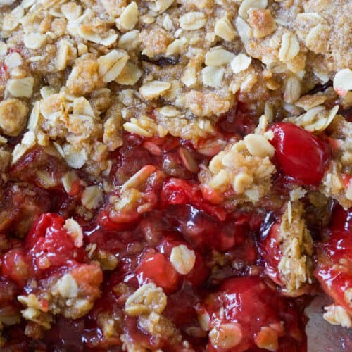 Baked cherry crisp dessert.