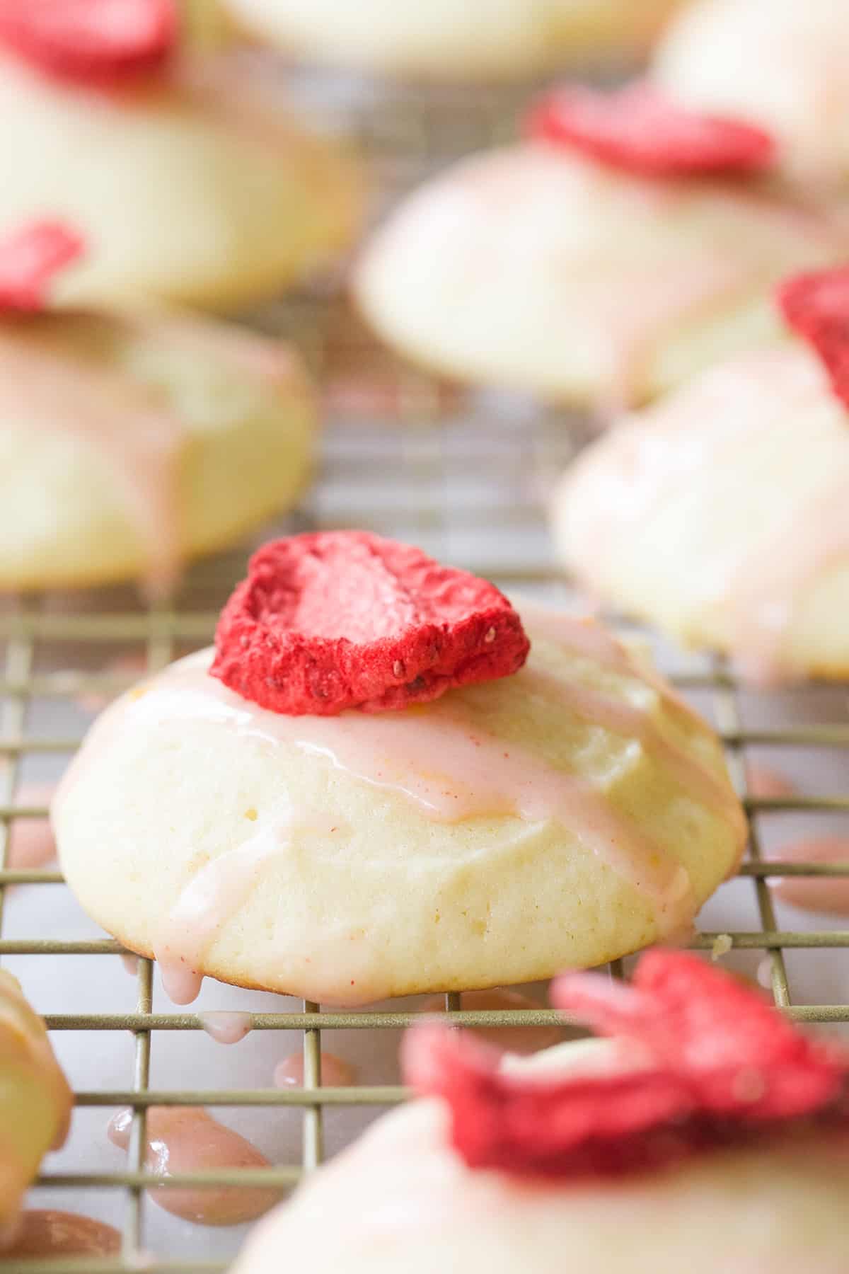 Lemon cookie with freeze-dried strawberry and lemon glaze.