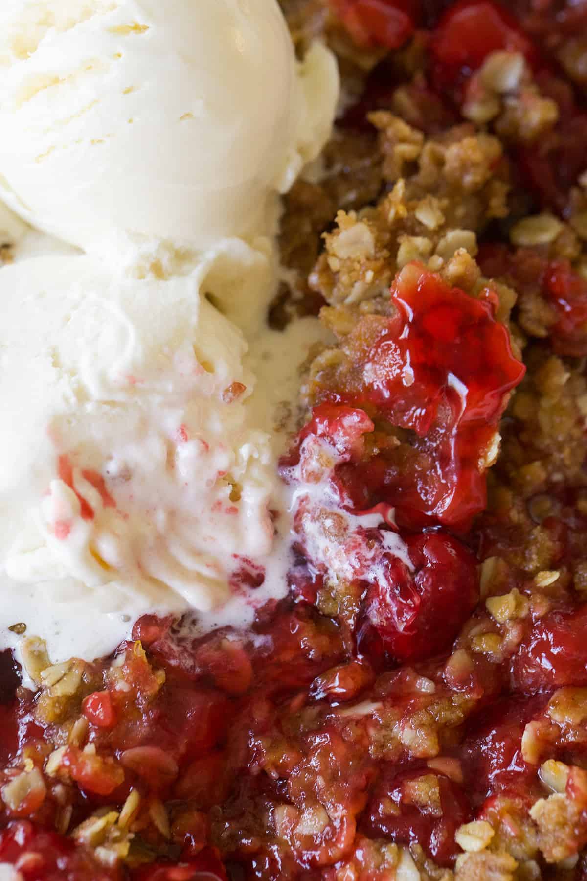 Easy cherry crisp with vanilla ice cream.