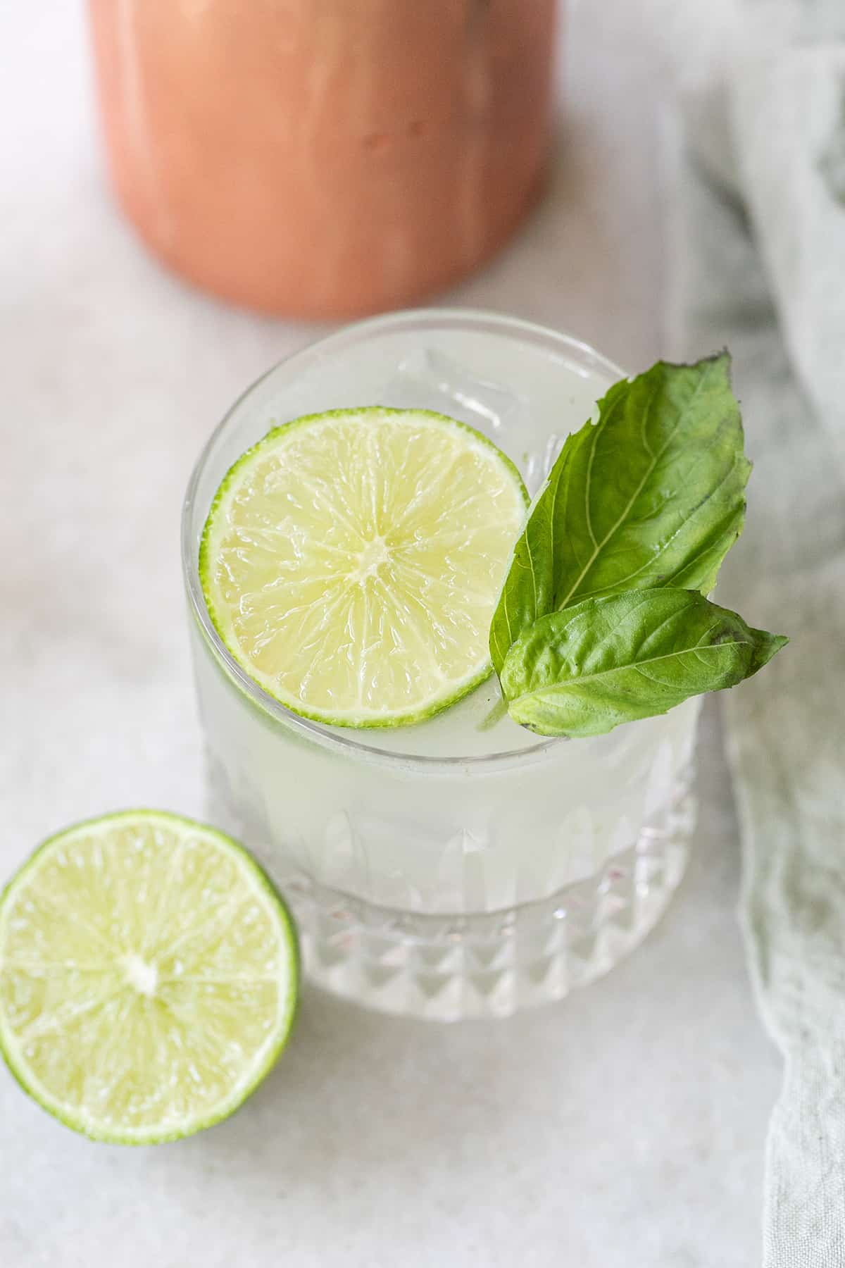 Basil gin smash with lime and fresh basil.