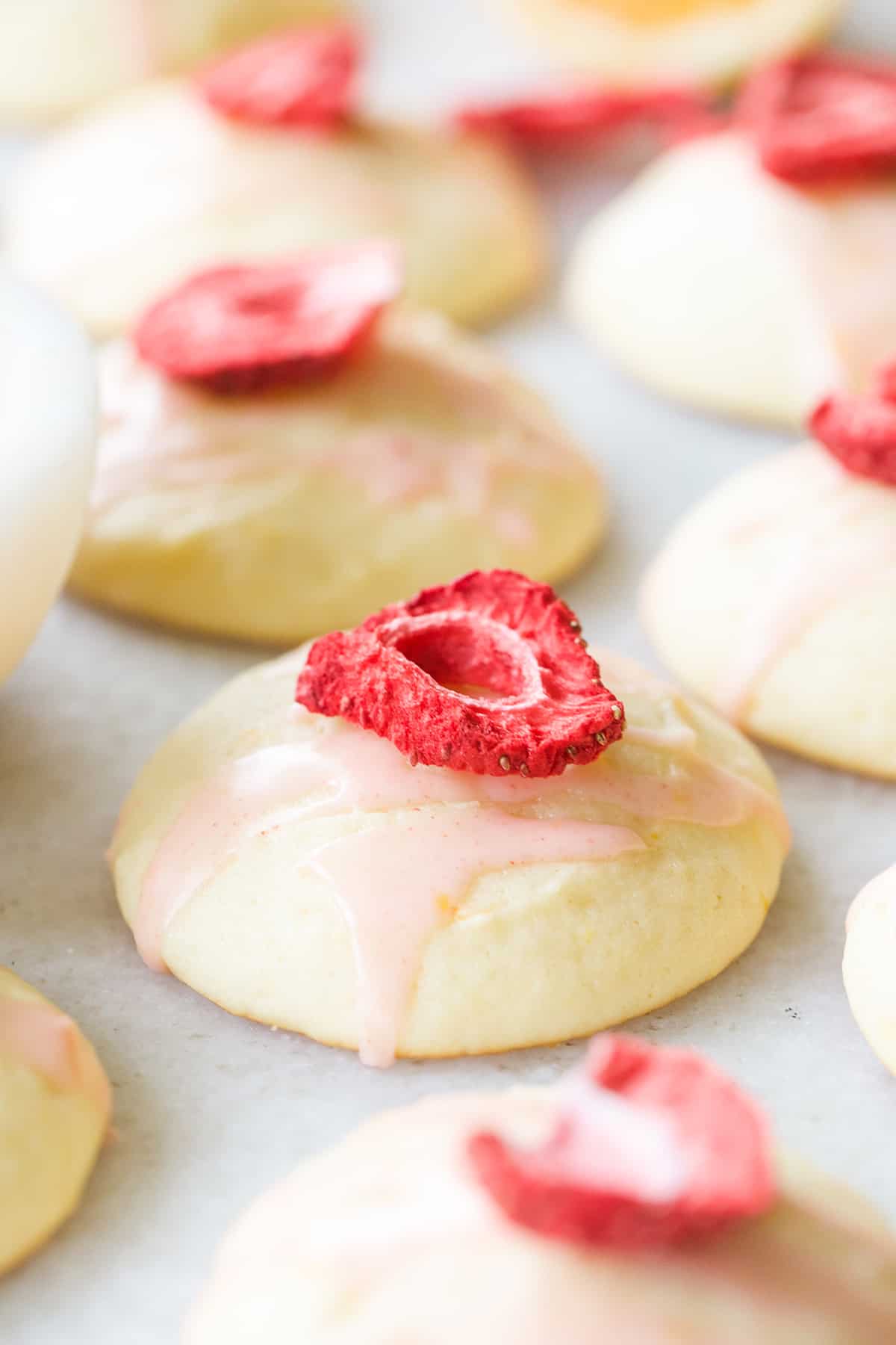 Lemon Ricotta Cookies with strawberry glaze.