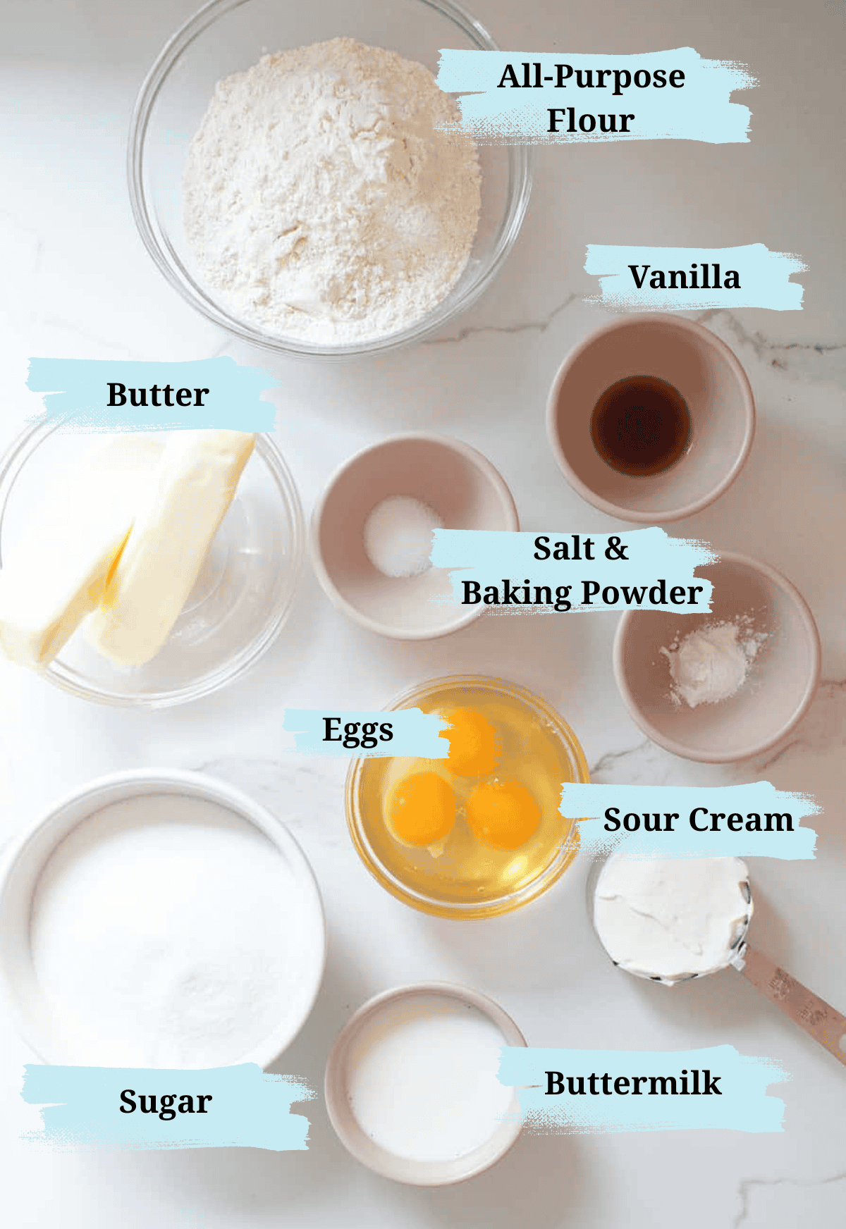 Ingredients in a pound cake recipe on a table.