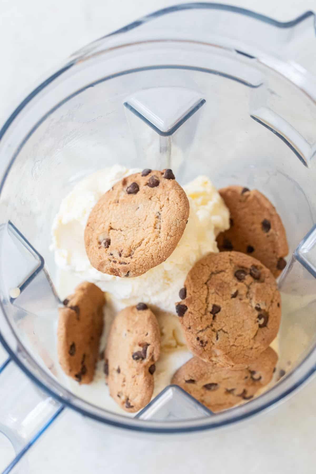 Chocolate chip cookies in a blender with ice cream.