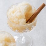 Frozen apple cider slushie with cinnamon stick.