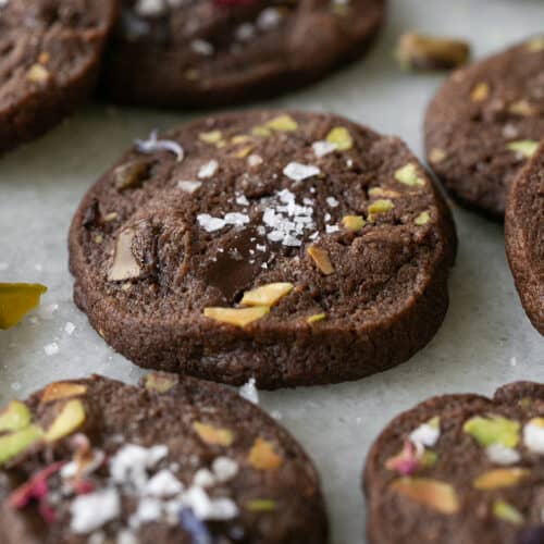 Chocolate sable cookies with pistachios.