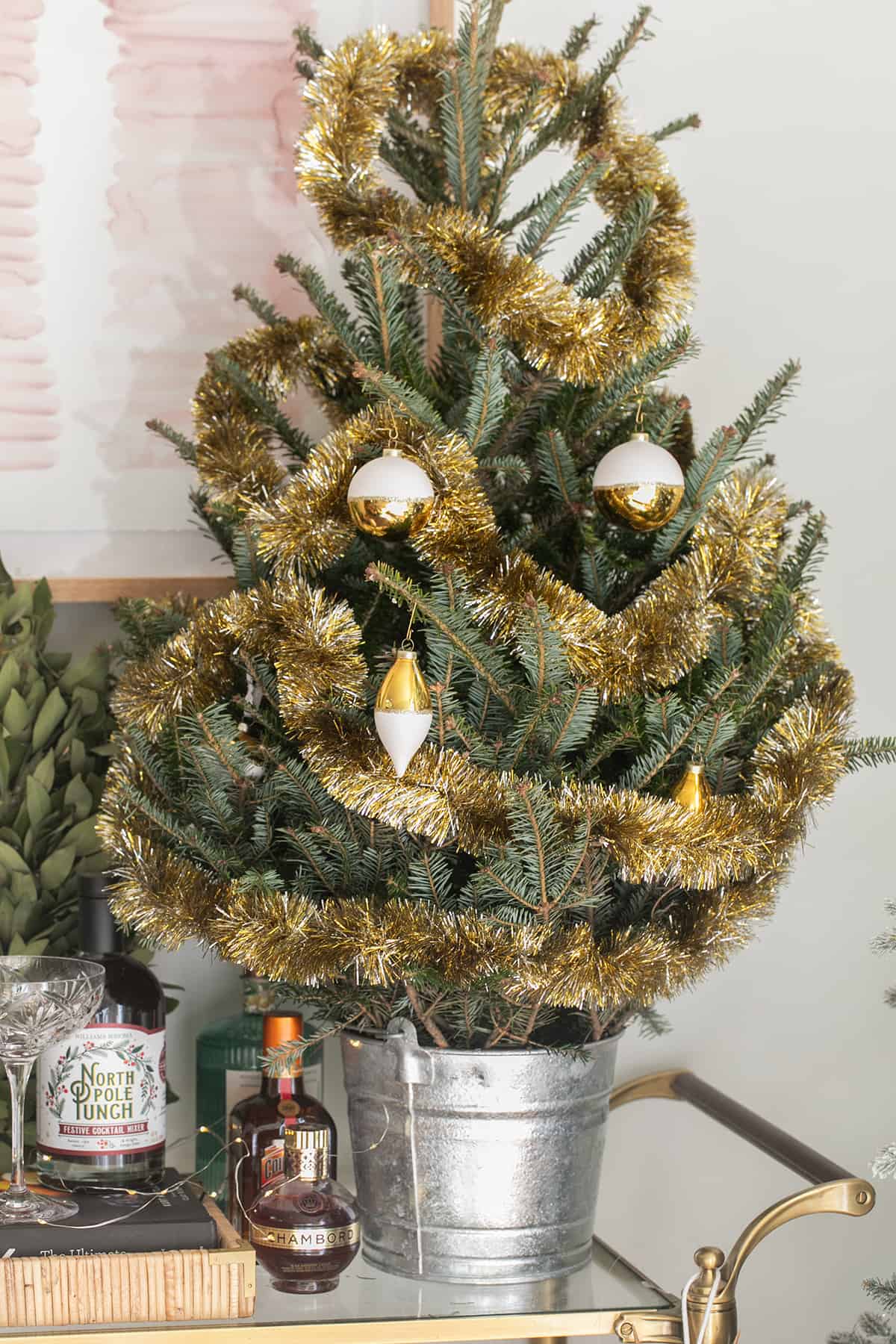 Small Christmas tree with garland. 