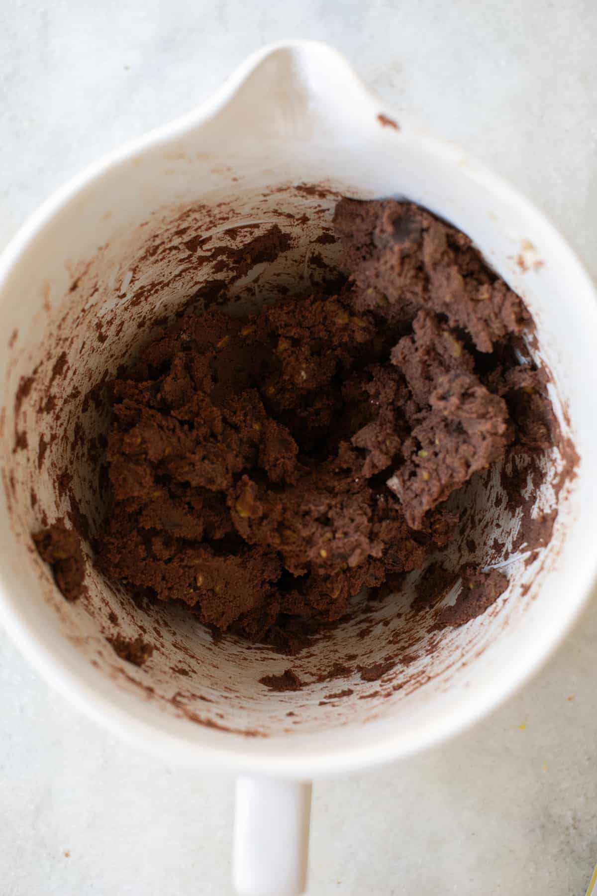 Sable chocolate cookie dough in a mixing bowl.