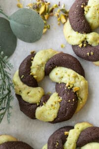 Christmas cookie recipe , twisted wreath cookies with chocolate and pistachios.