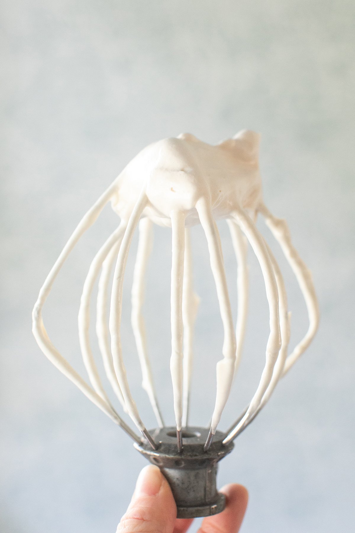 Maple syrup frosting on a whisk.