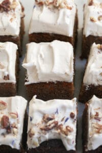 Slices of carrot cakes with frosting.