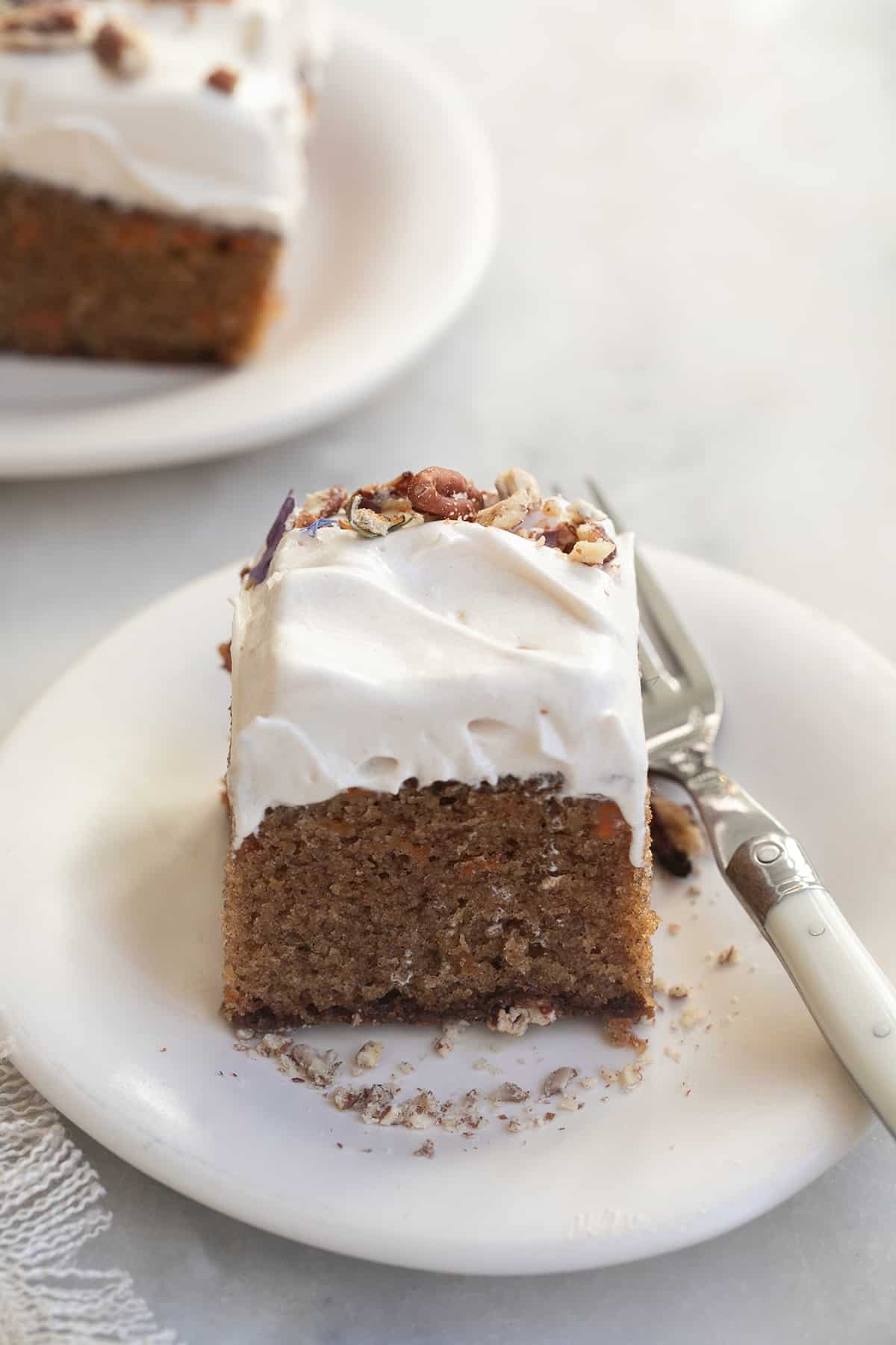 Simple carrot cake slice with frosting.