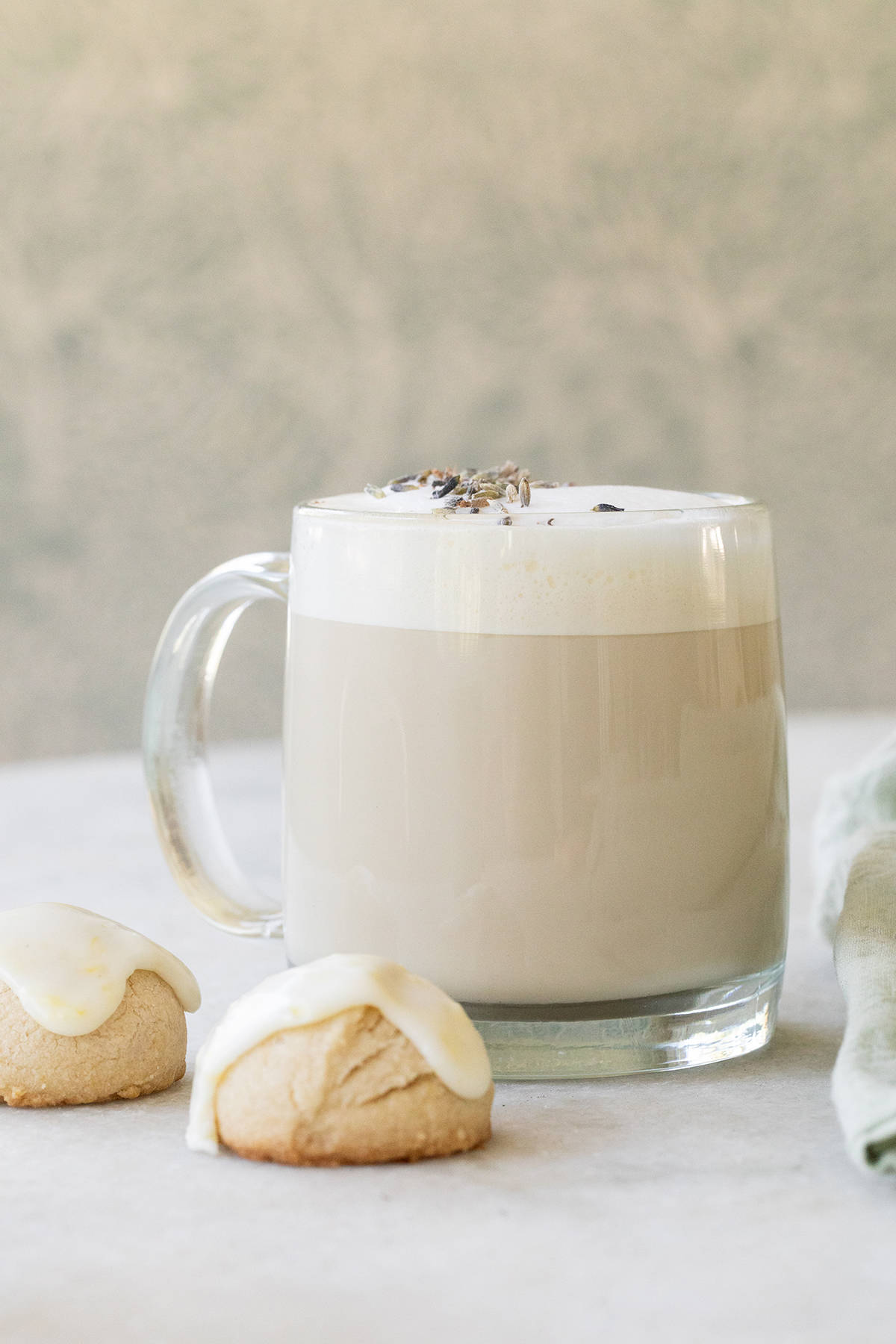 Creamy, frothy London fog latte with little lemon cookies.
