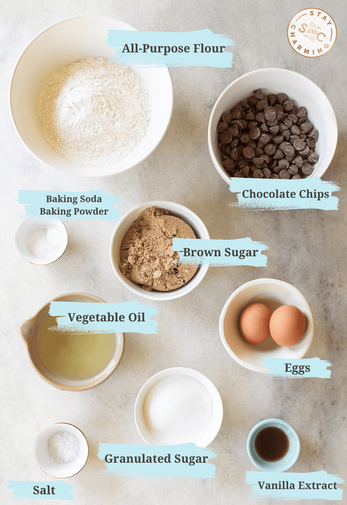 Flour, brown sugar, baking soda, baking powder, granulated sugar, eggs, oil and vanilla extract measured out in small bowls.