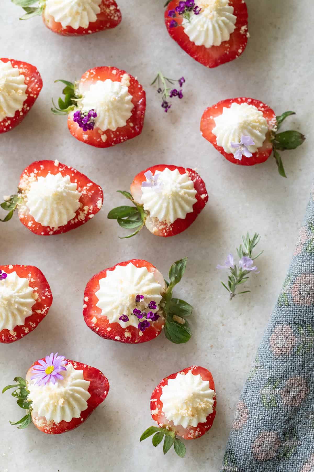Deviled strawberry party appetizer with whipped cheesecake.
