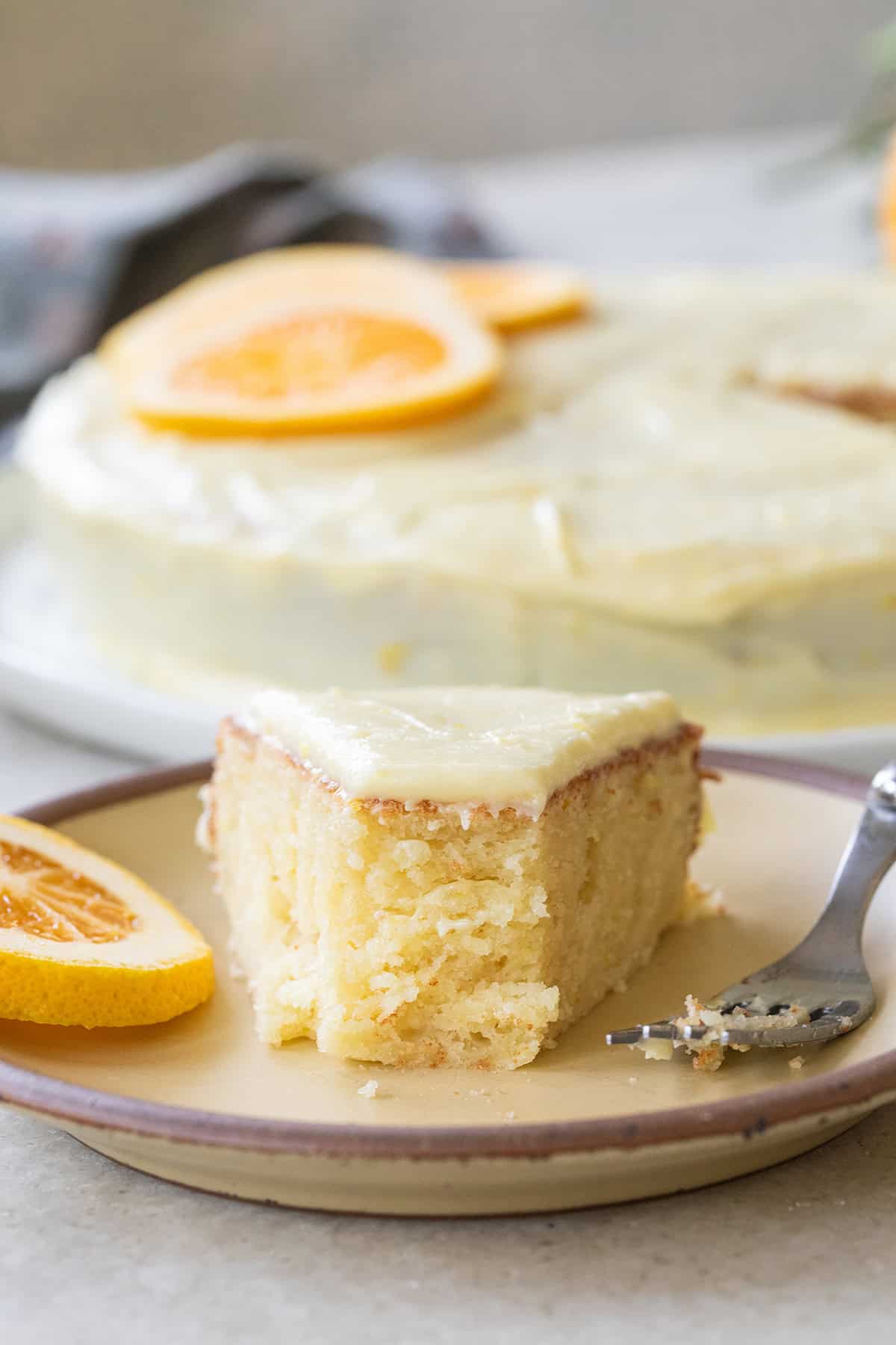 Ricotta cake with orange zest and orange icing.