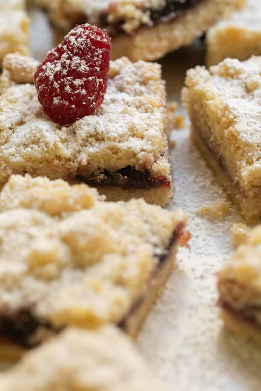 Raspberry shortbread crumble bars with jam filling.