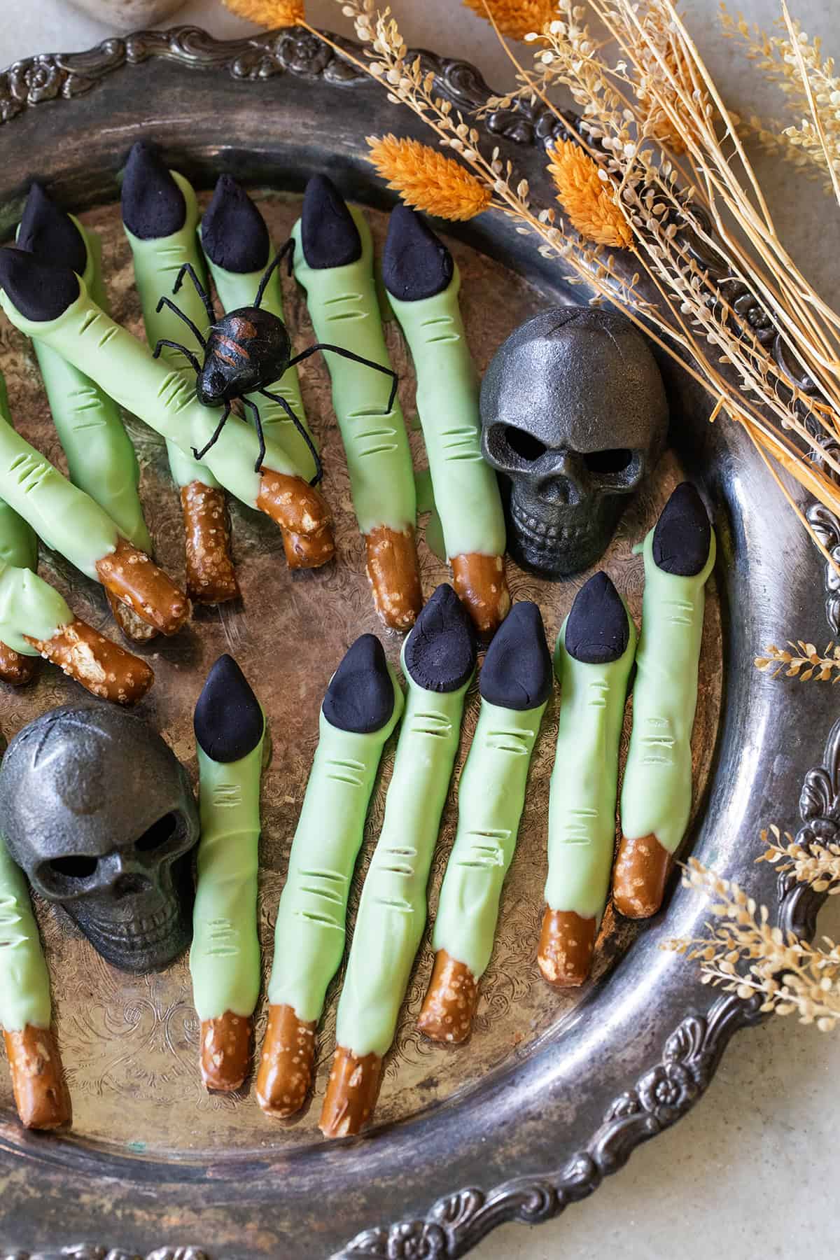 Witch finger pretzels with black fondant nails.