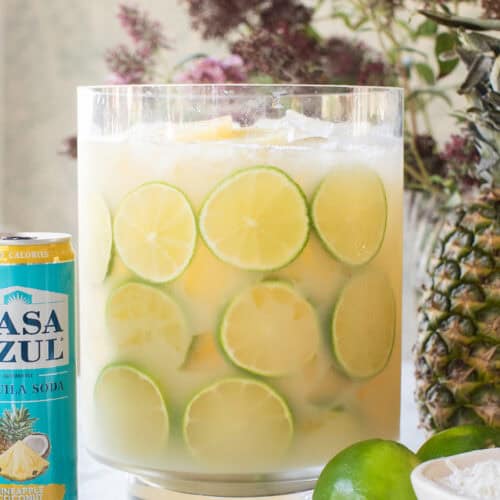 Tequila punch recipe with pineapple and coconut.