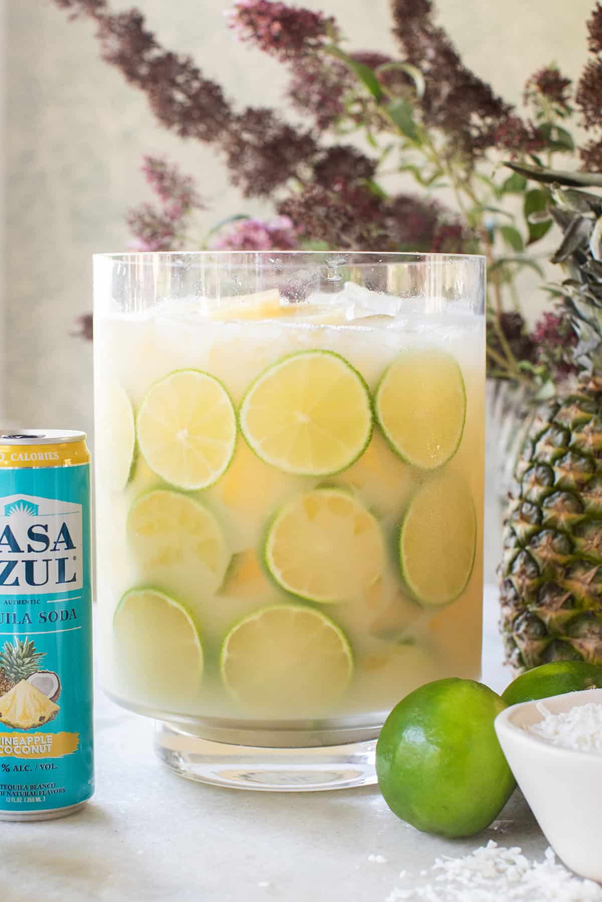 Tequila punch recipe with pineapple and coconut. 