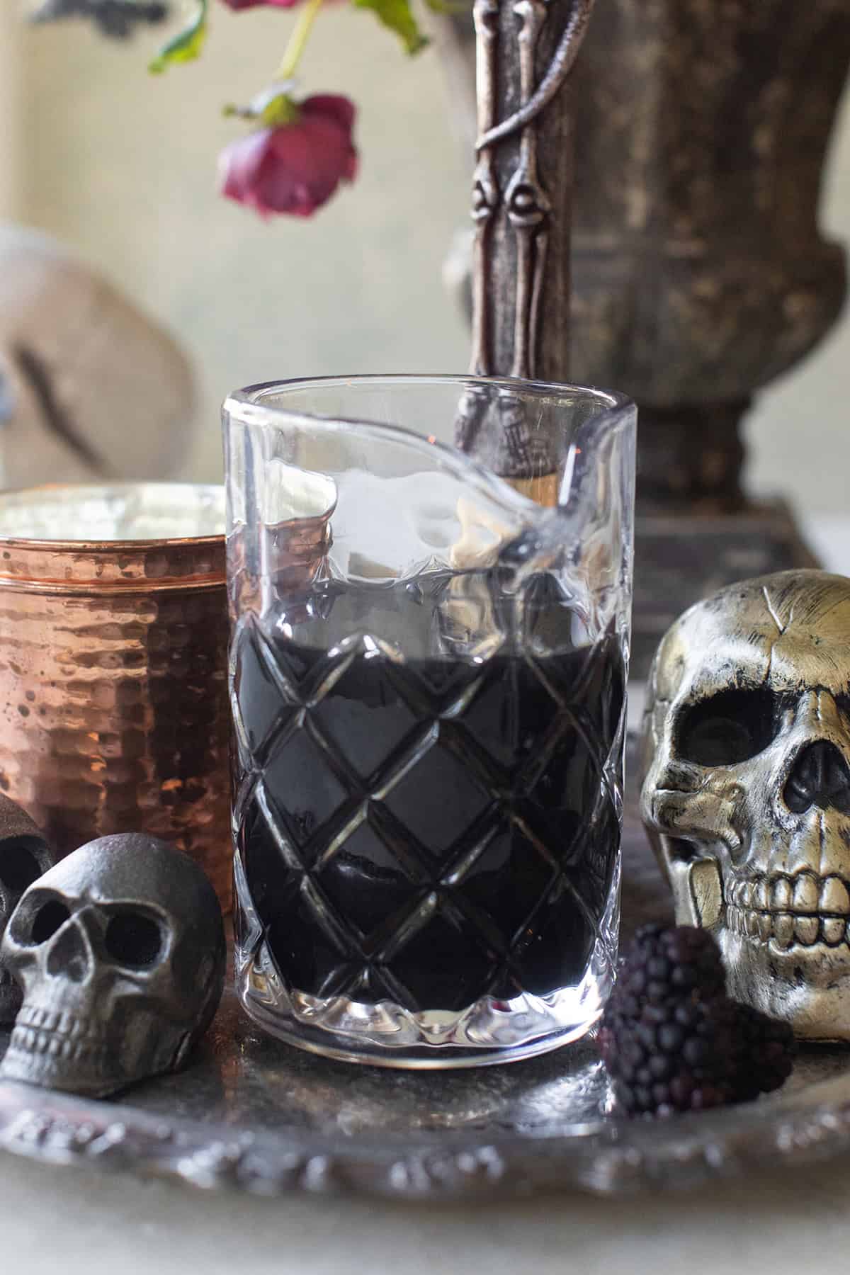 Black vodka in a jar made with vodka and activated charcoal. 