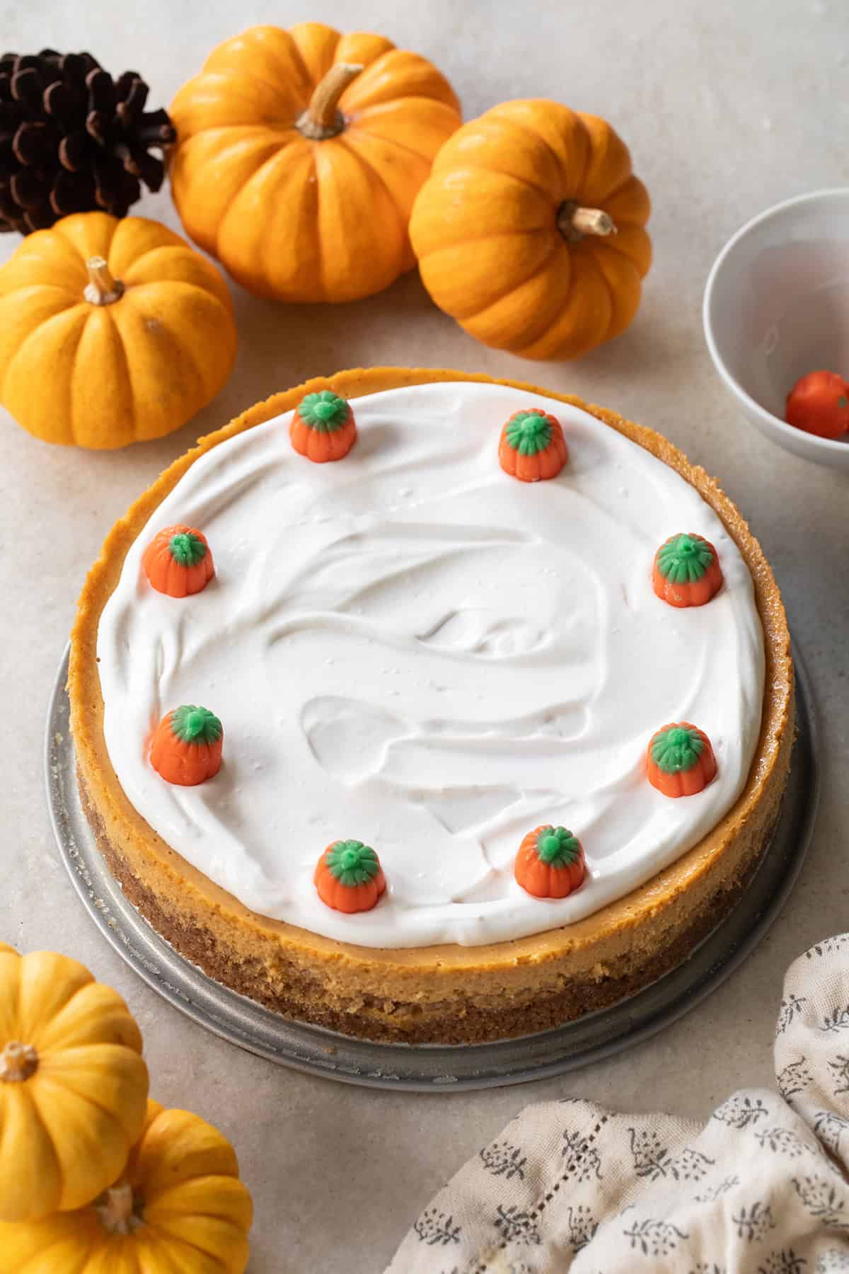 Cheesecake recipe for fall with pumpkin, spices and a graham cracker crust.