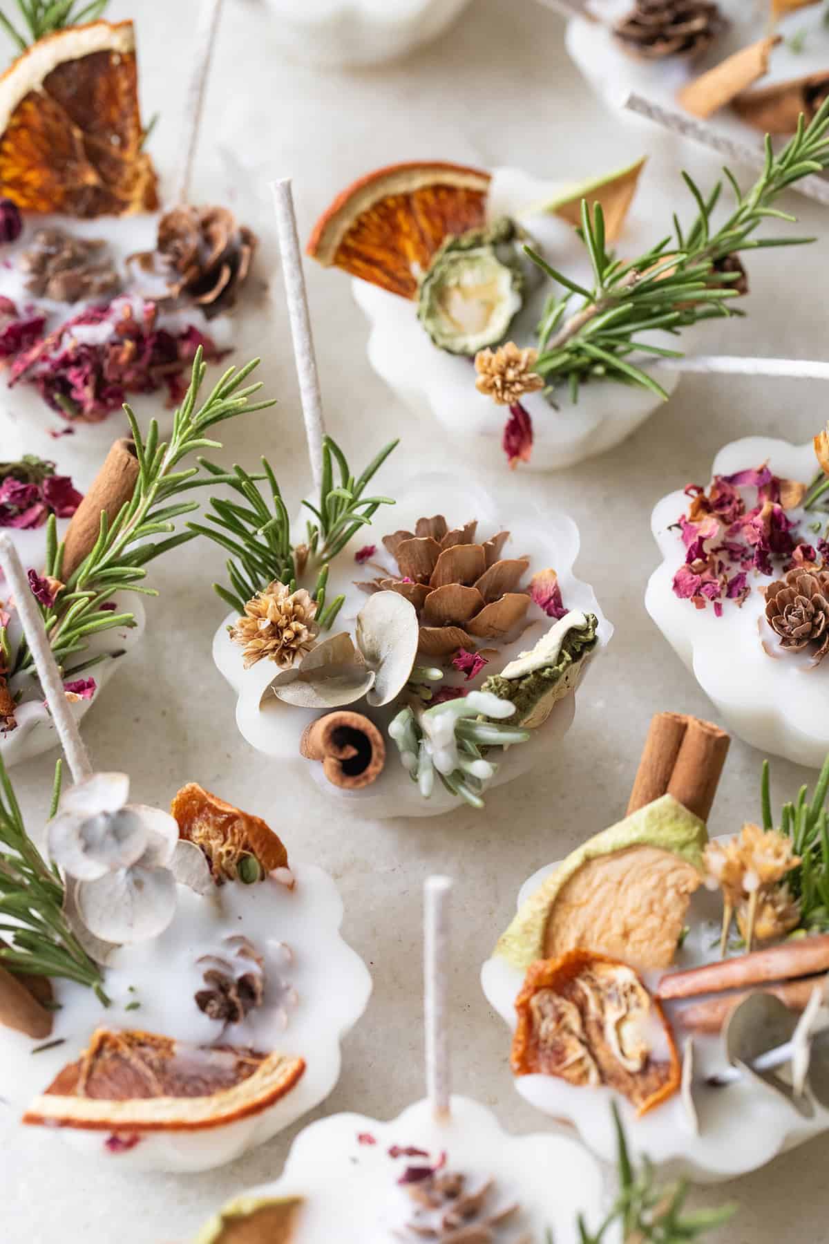 Homemade fire starters with herbs, flowers and natural elements.