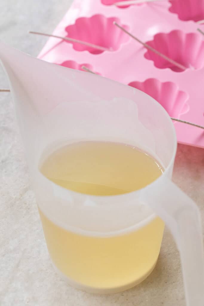 Melted beeswax in a container.