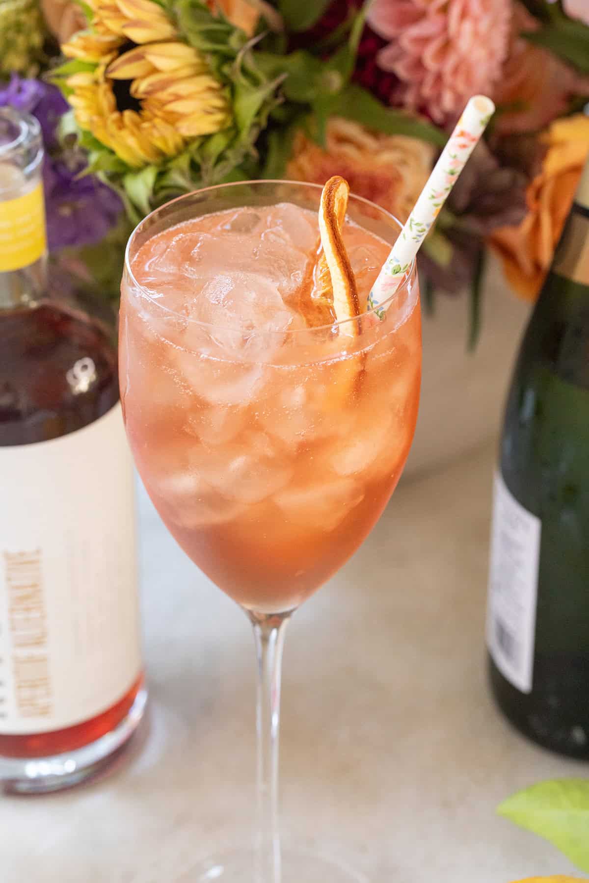 Easy Aperol spritz mocktail in a tall glass.