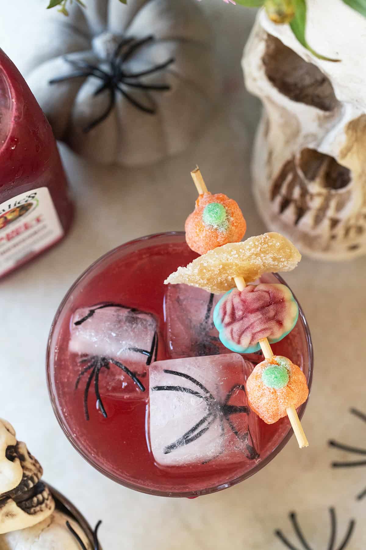 A mocktail for Halloween with zero-proof spirits and sparkling wine.