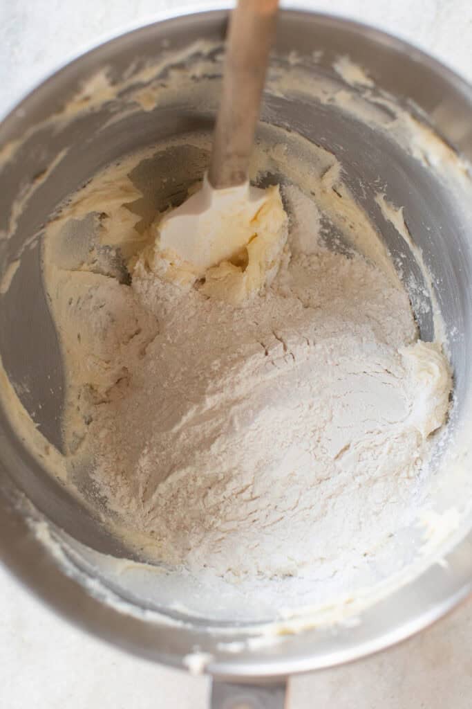 Adding flour to the butter.