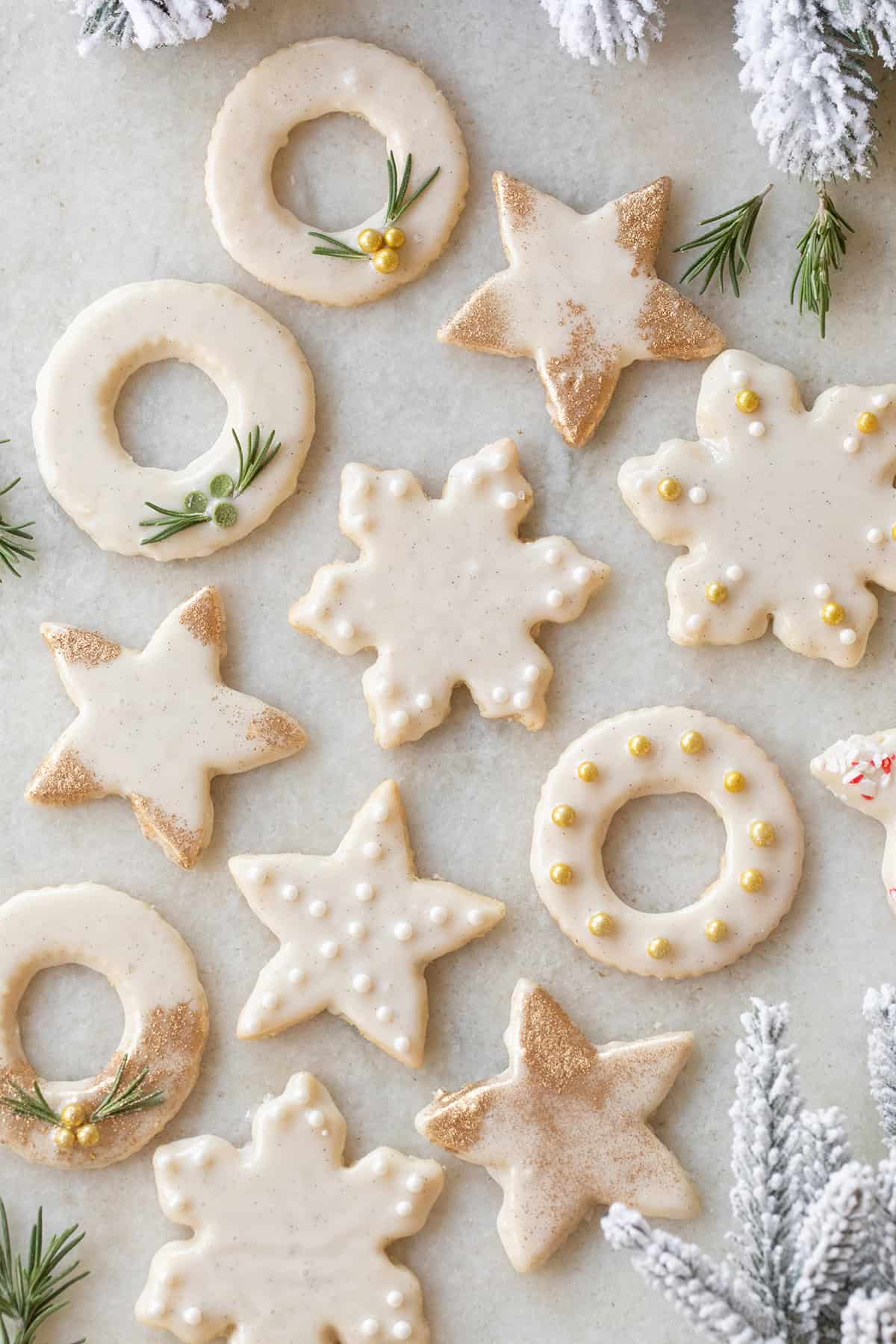 Cutout shortbread cookies with vanilla bean glaze.