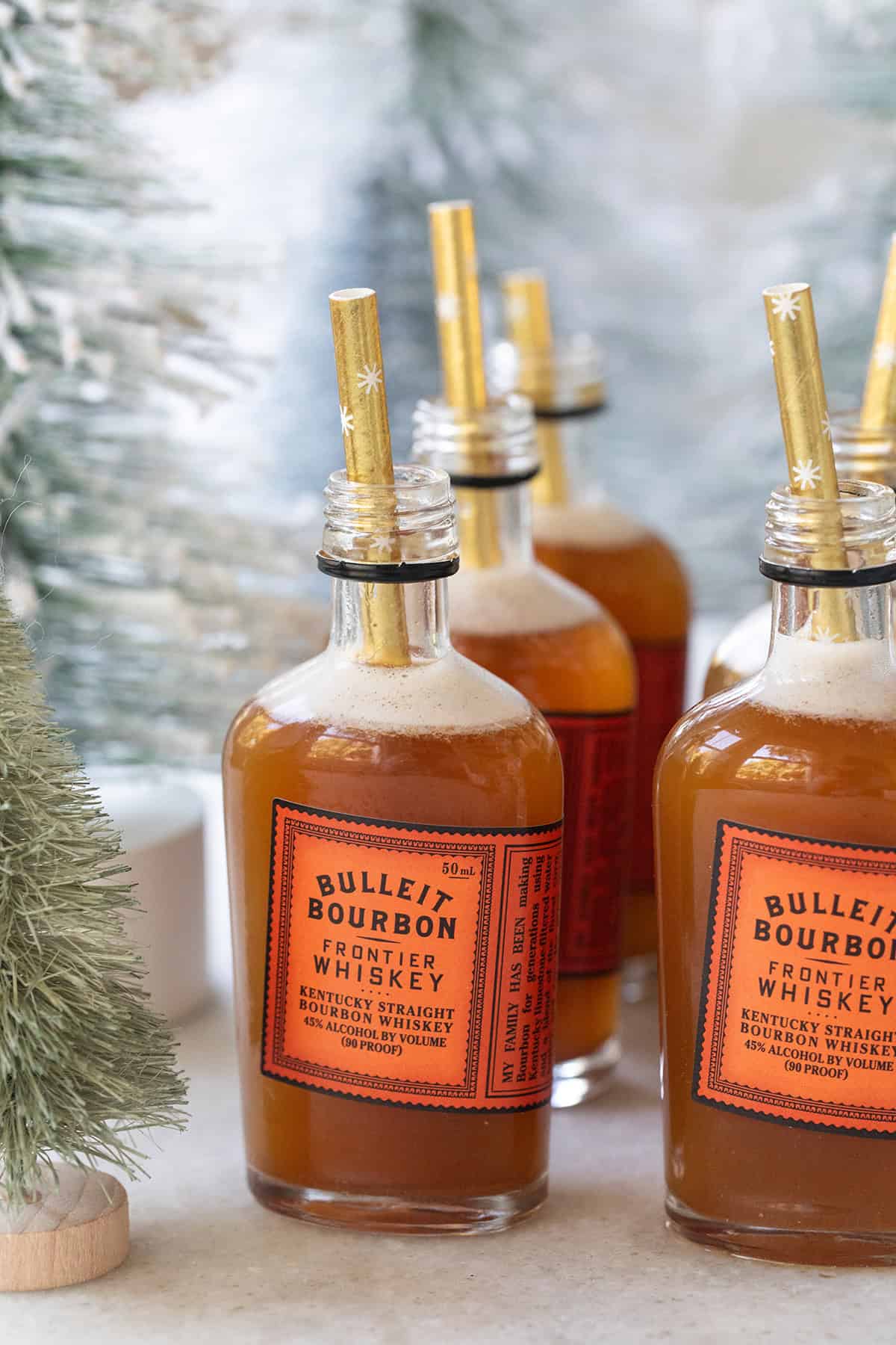 Gingerbread shots in tiny bourbon bottles.