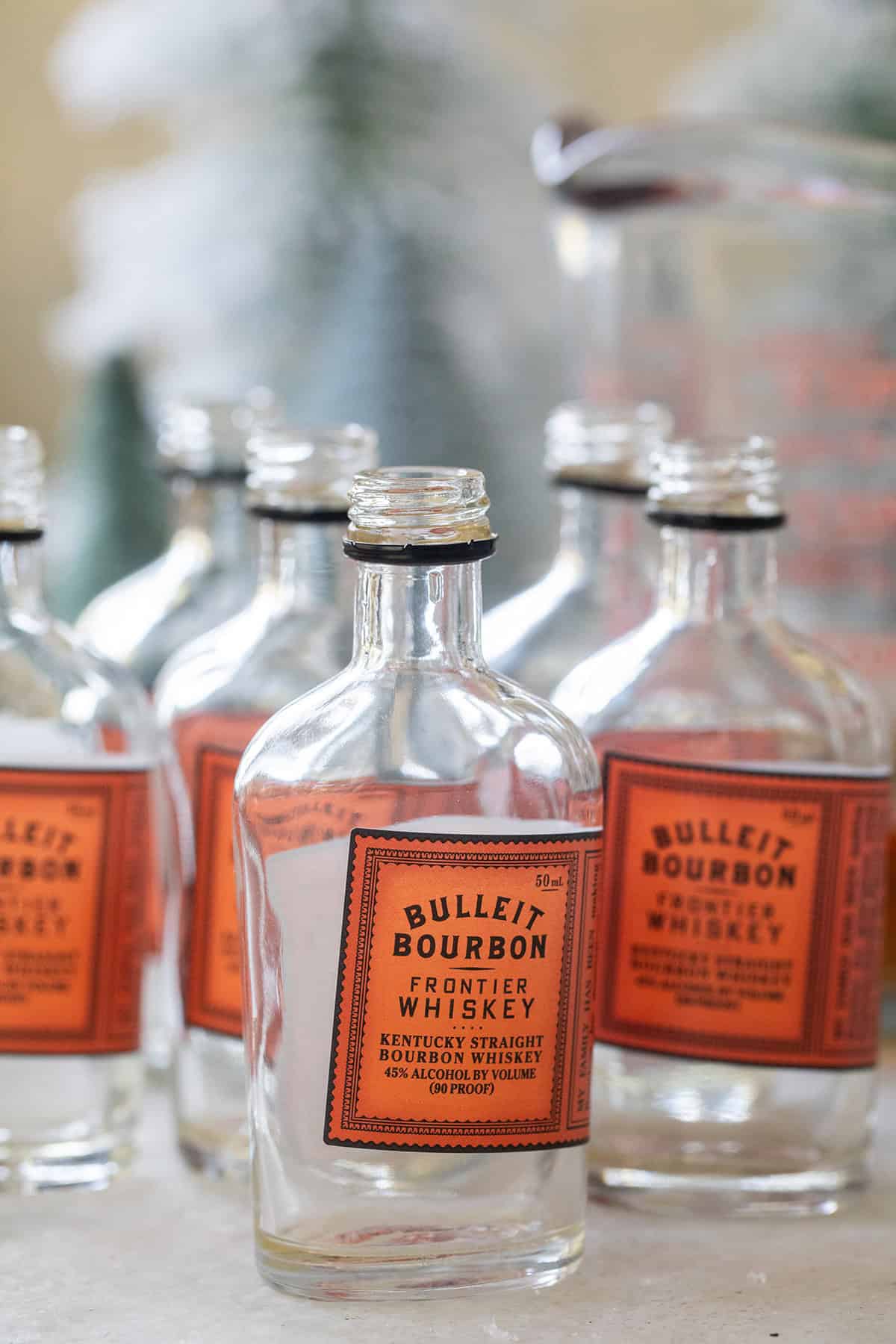 Empty bourbon bottles to fill with gingerbread shots.