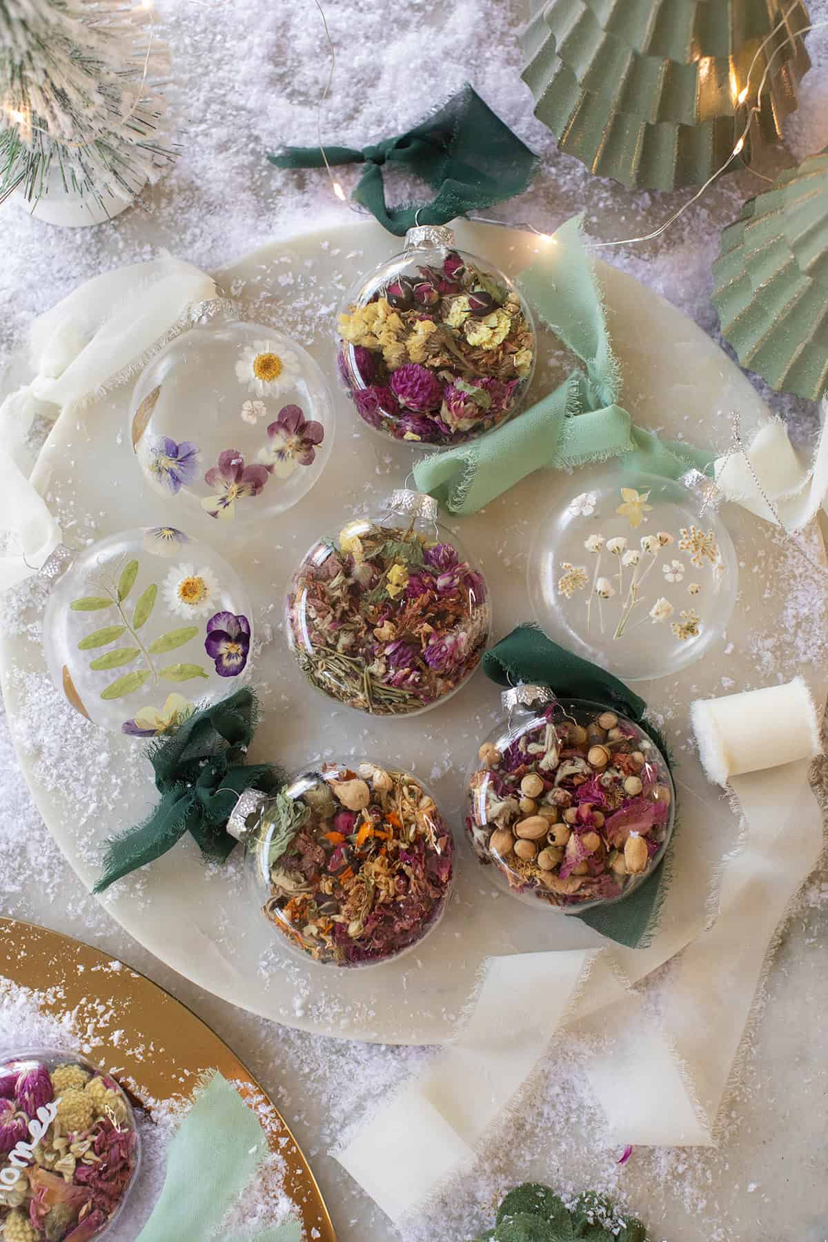 Christmas ornaments made with dried flowers. 